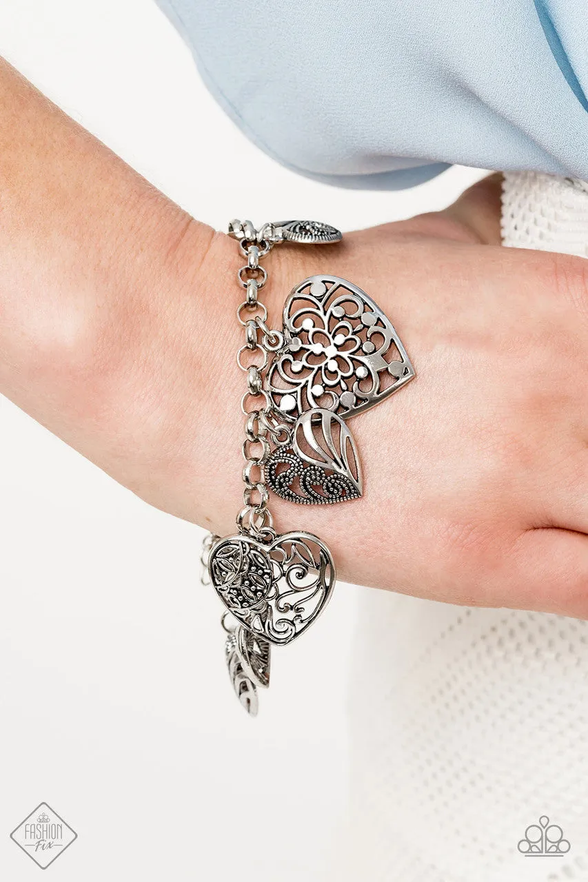 Completely Devoted Silver Paparazzi Bracelet