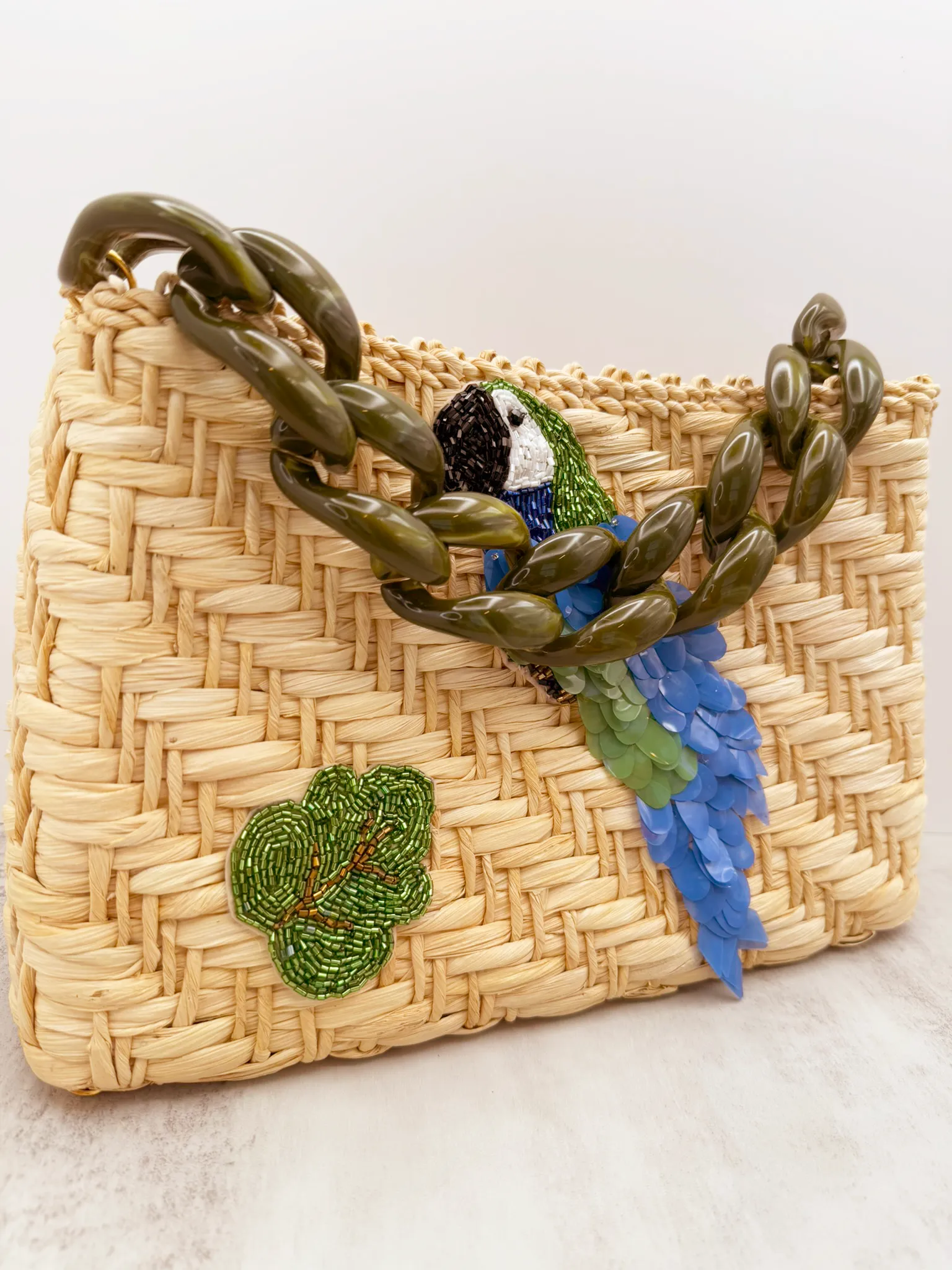 Parrot Paradise Handcrafted Bag – Natural Straw Fiber with Embellished Sequins and Resin Handle