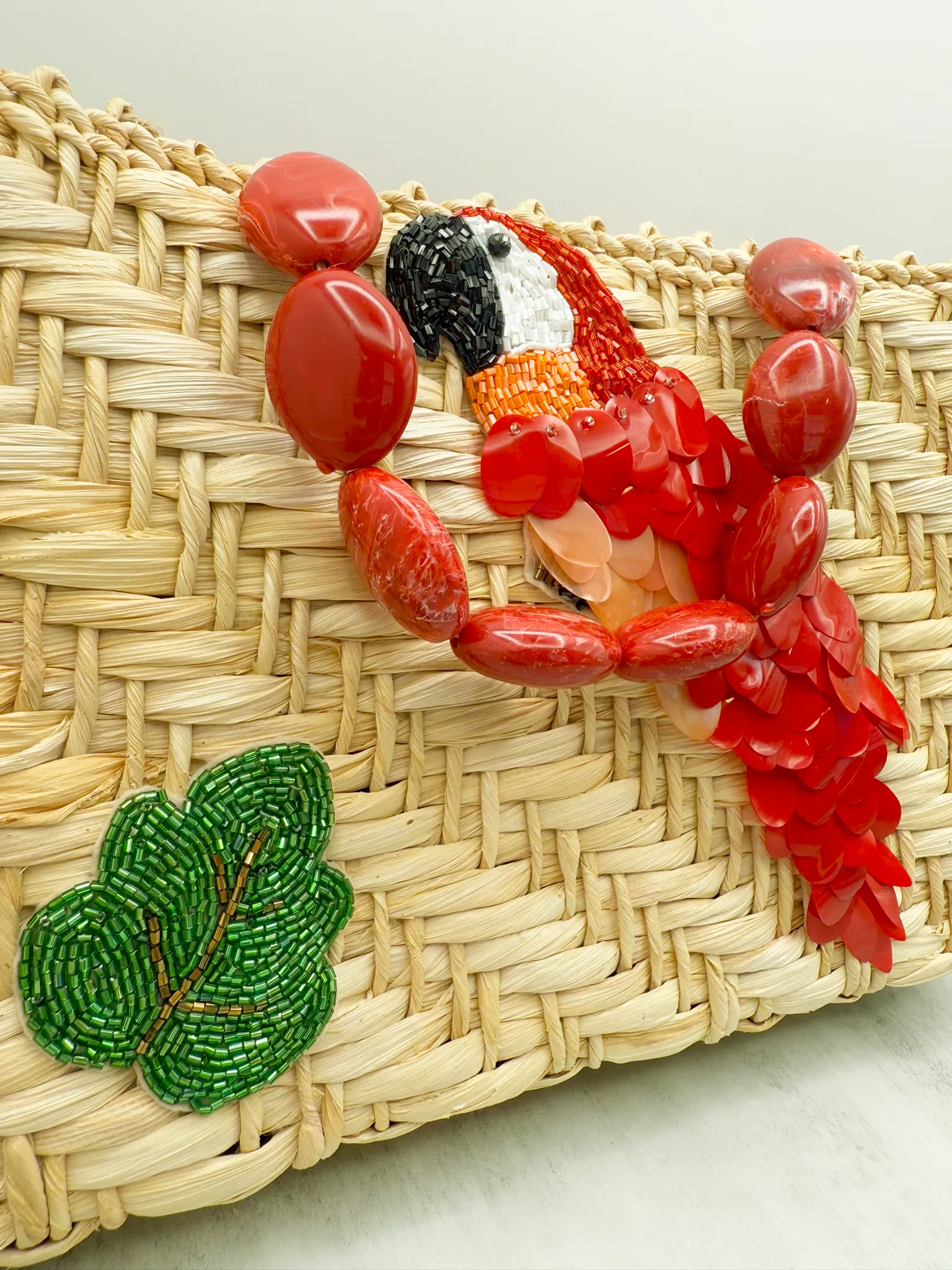 Parrot Paradise Handcrafted Bag – Natural Straw Fiber with Embellished Sequins and Resin Handle