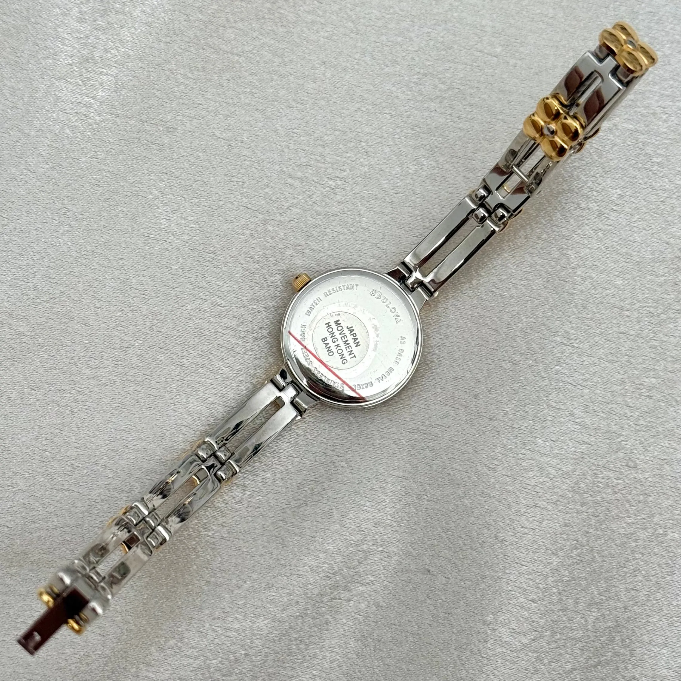 VINTAGE CARAVELLE BY BULOVA MOTHER-OF-PEARL TWO-TONED WATCH