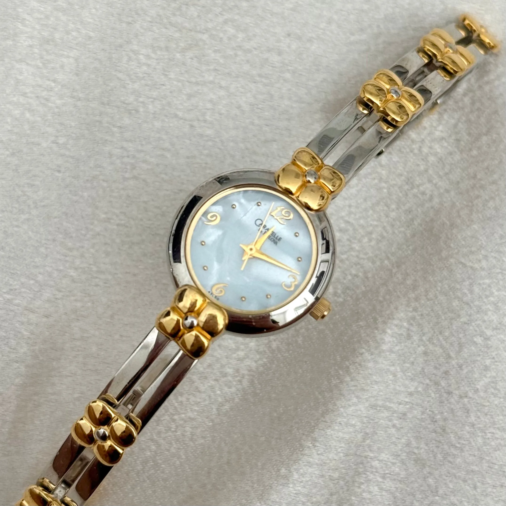 VINTAGE CARAVELLE BY BULOVA MOTHER-OF-PEARL TWO-TONED WATCH