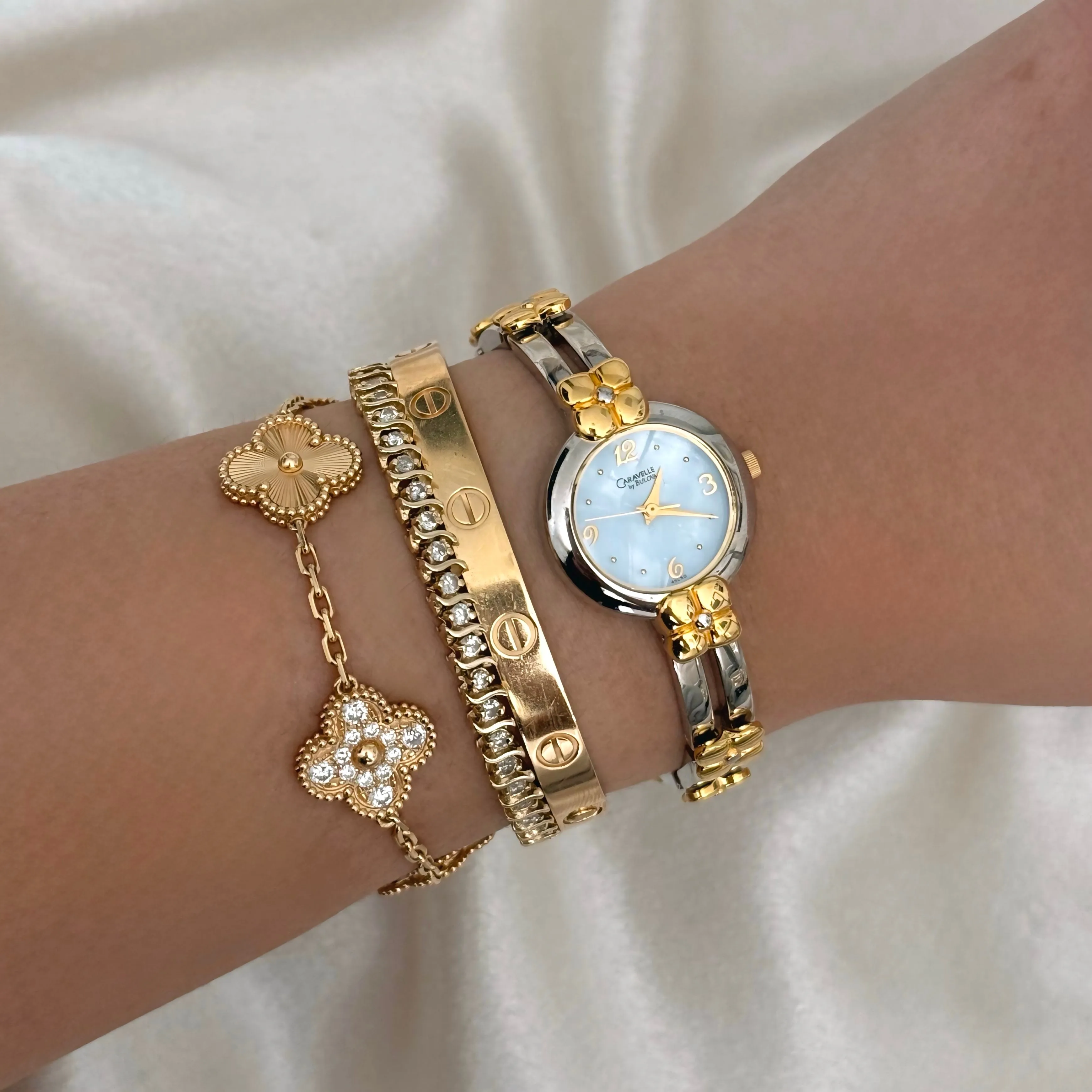 VINTAGE CARAVELLE BY BULOVA MOTHER-OF-PEARL TWO-TONED WATCH