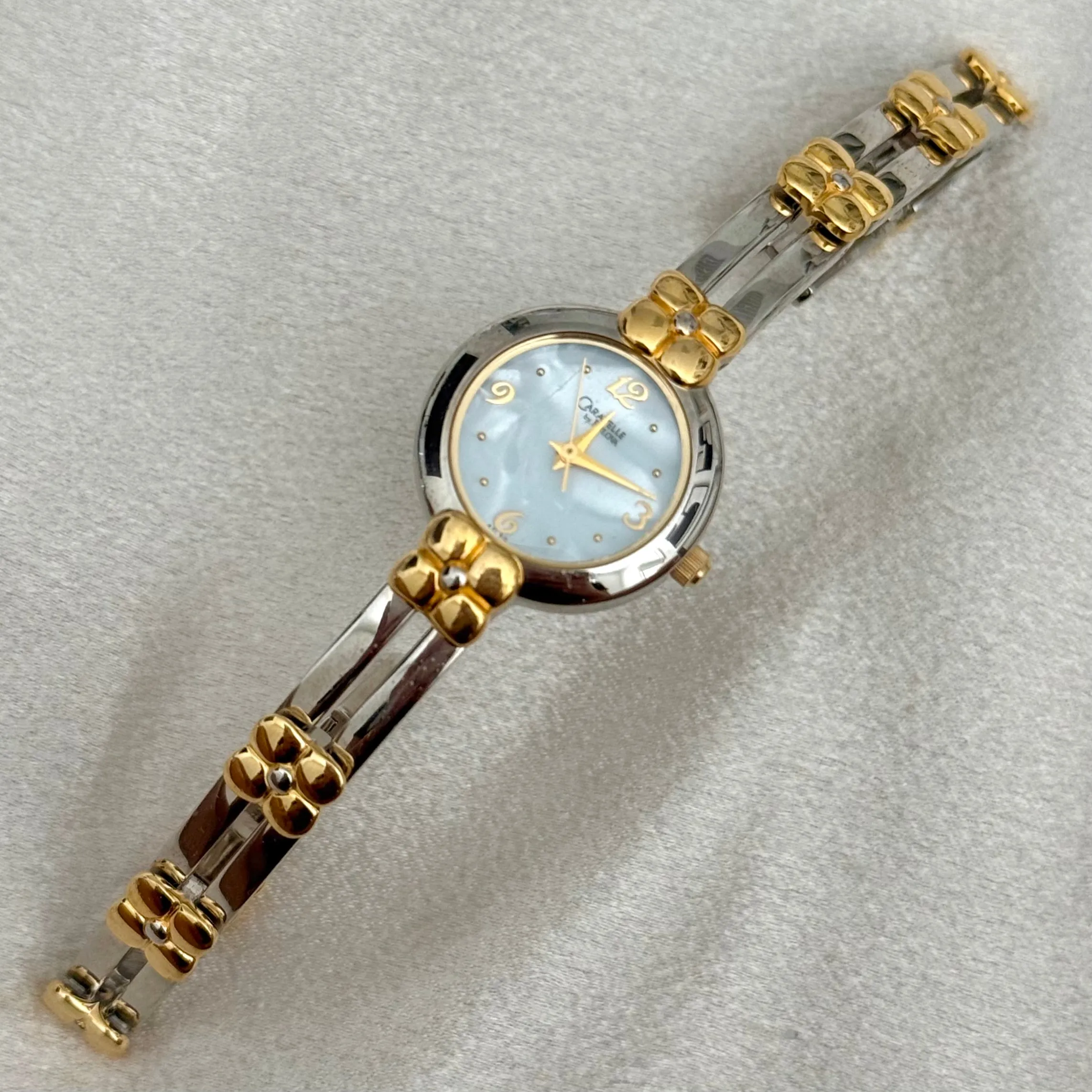 VINTAGE CARAVELLE BY BULOVA MOTHER-OF-PEARL TWO-TONED WATCH