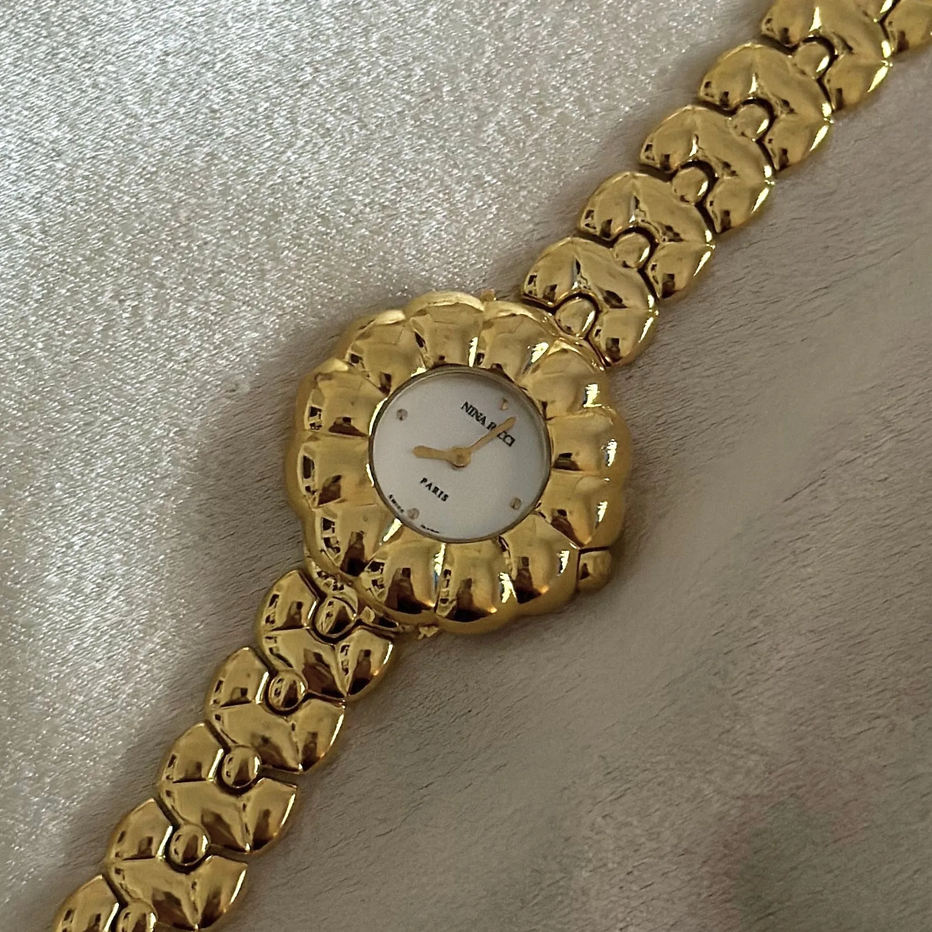VINTAGE NINA RICCI MOTHER-OF-PEARL DIAMOND WATCH