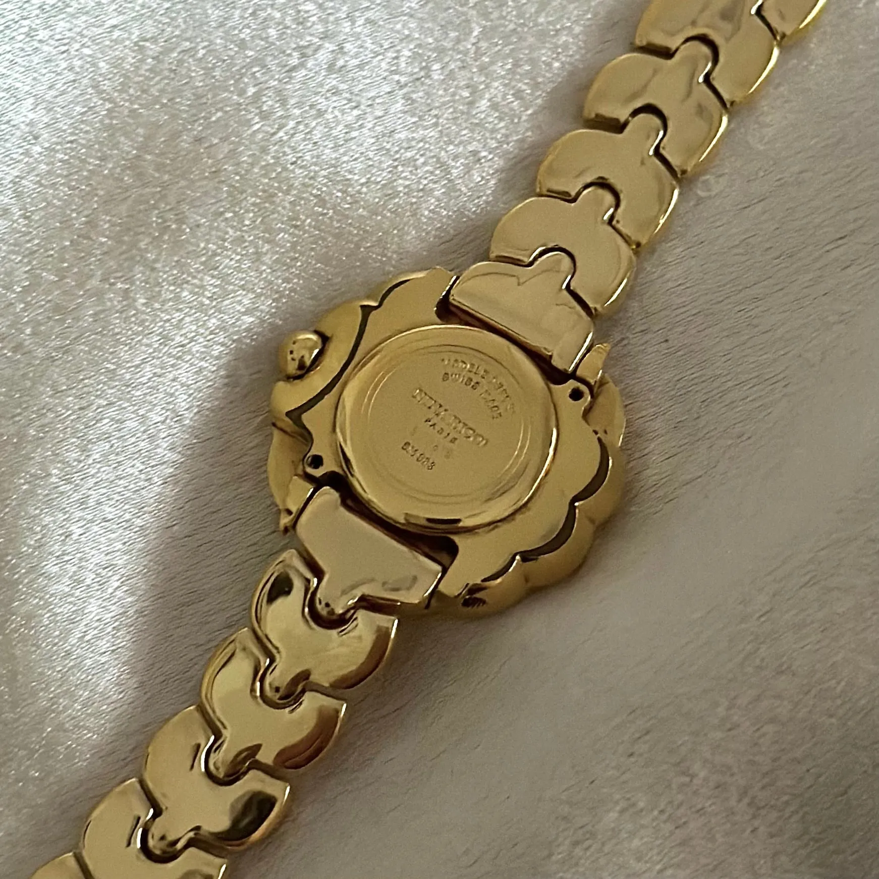 VINTAGE NINA RICCI MOTHER-OF-PEARL DIAMOND WATCH