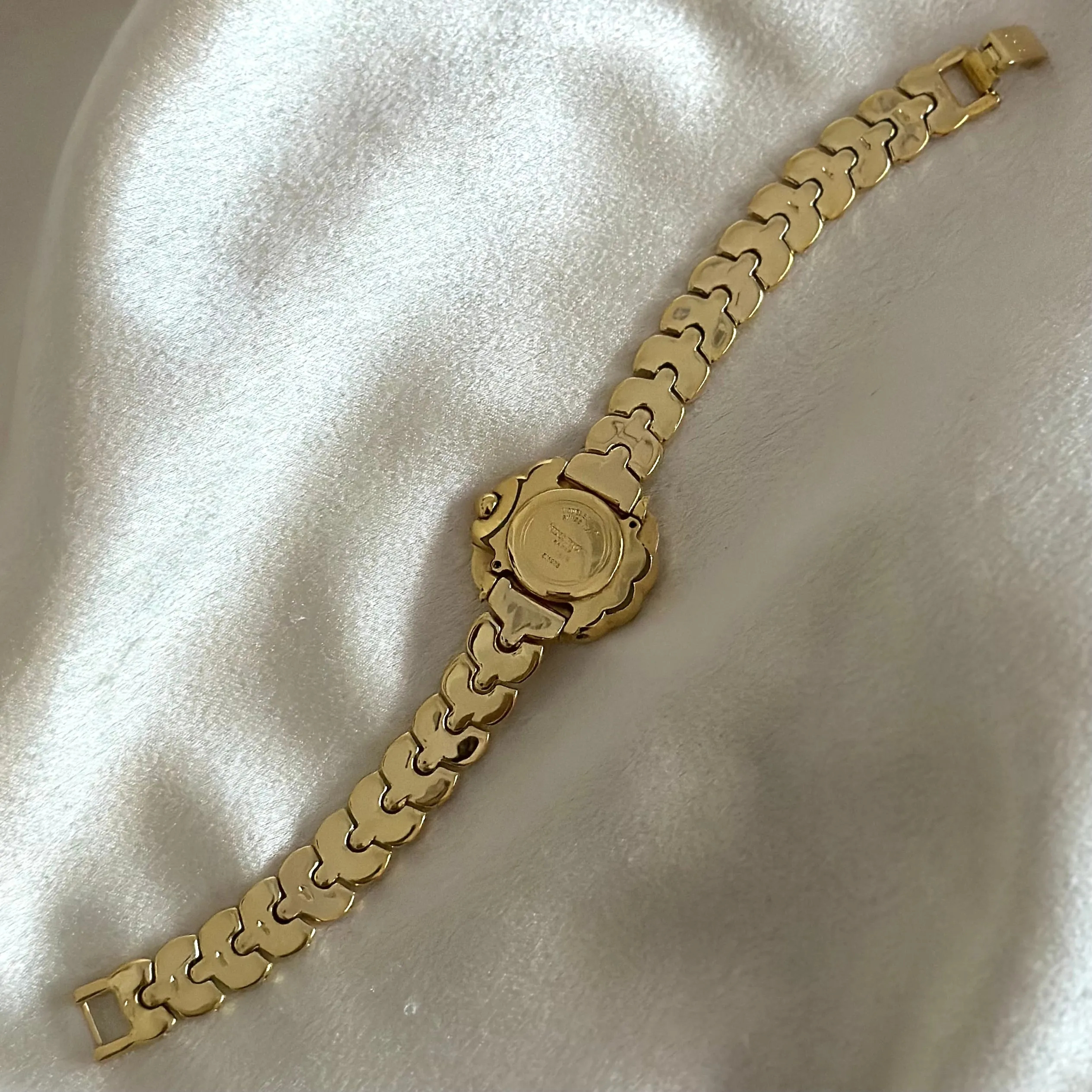 VINTAGE NINA RICCI MOTHER-OF-PEARL DIAMOND WATCH