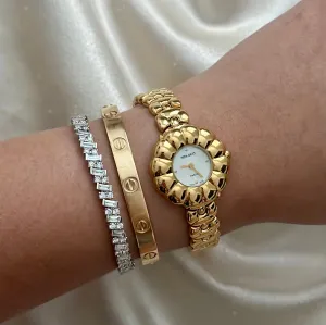 VINTAGE NINA RICCI MOTHER-OF-PEARL DIAMOND WATCH