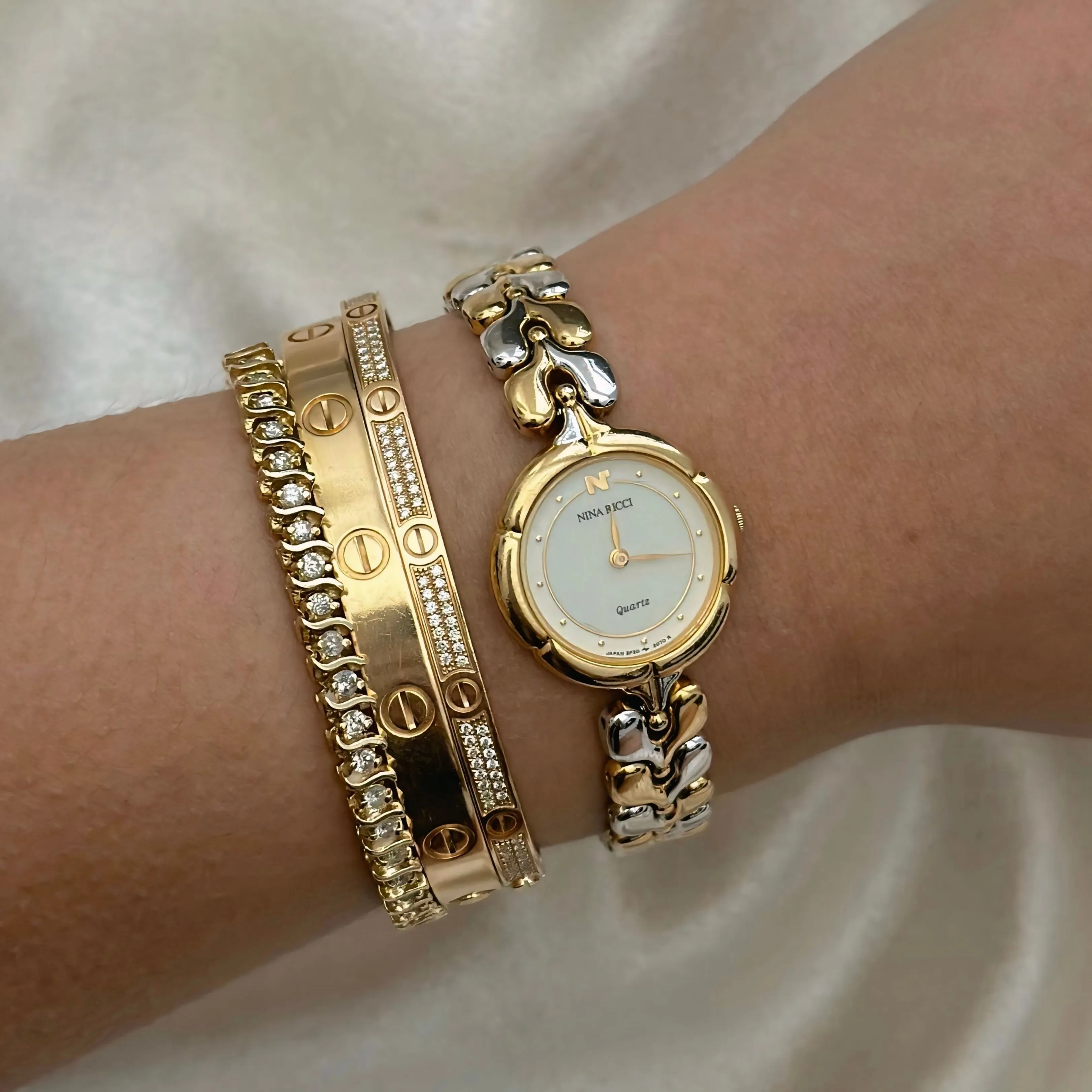 VINTAGE NINA RICCI MOTHER-OF-PEARL TWO-TONED WATCH