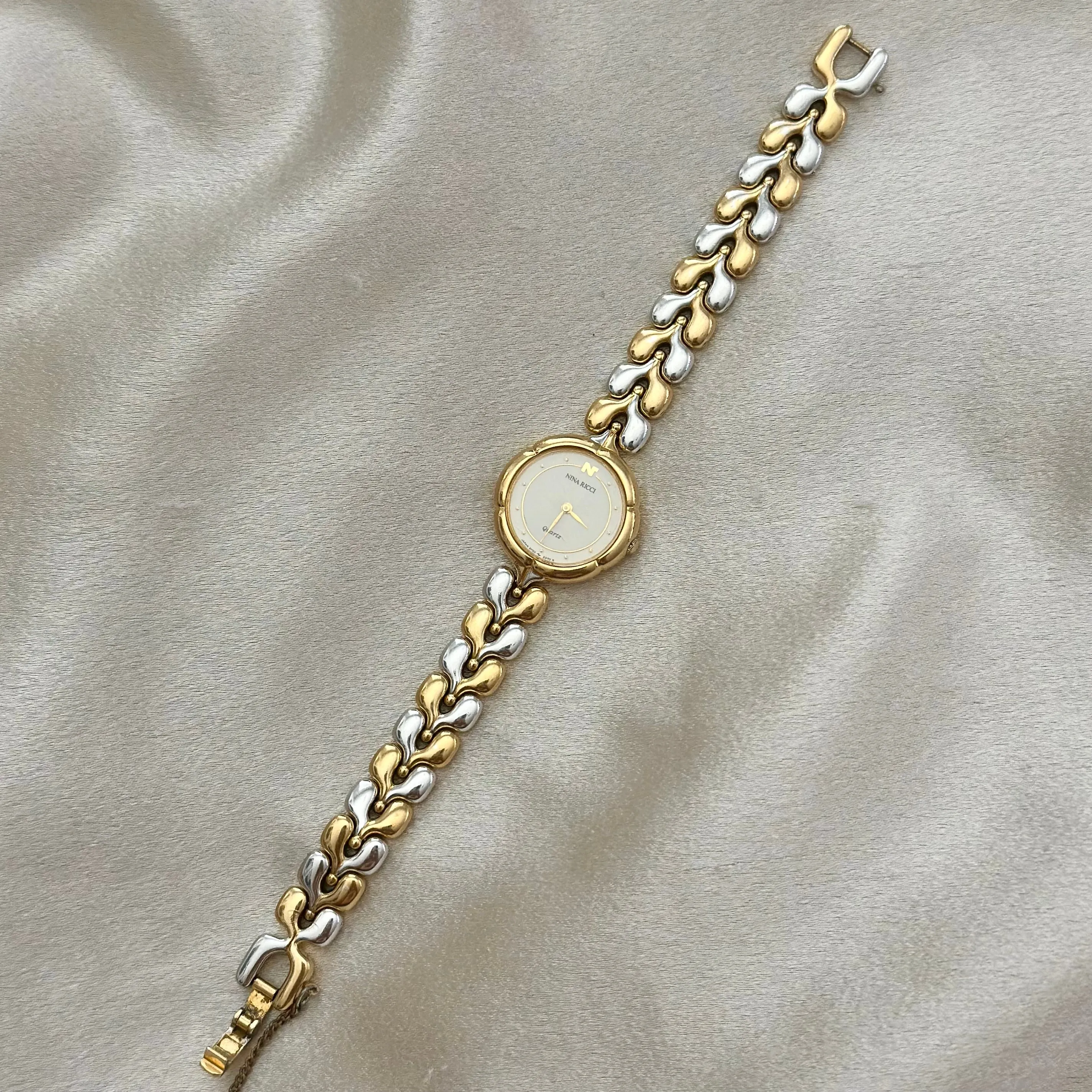 VINTAGE NINA RICCI MOTHER-OF-PEARL TWO-TONED WATCH