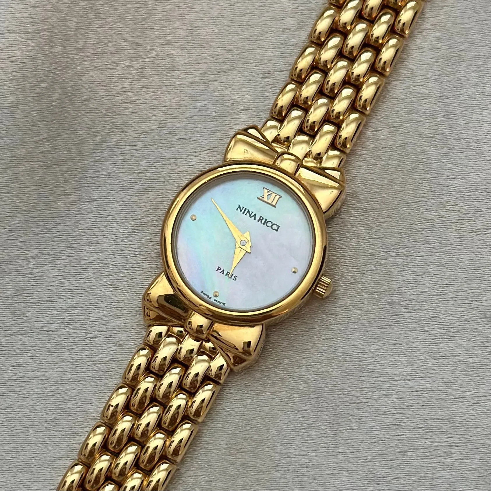VINTAGE NINA RICCI MOTHER-OF-PEARL WATCH