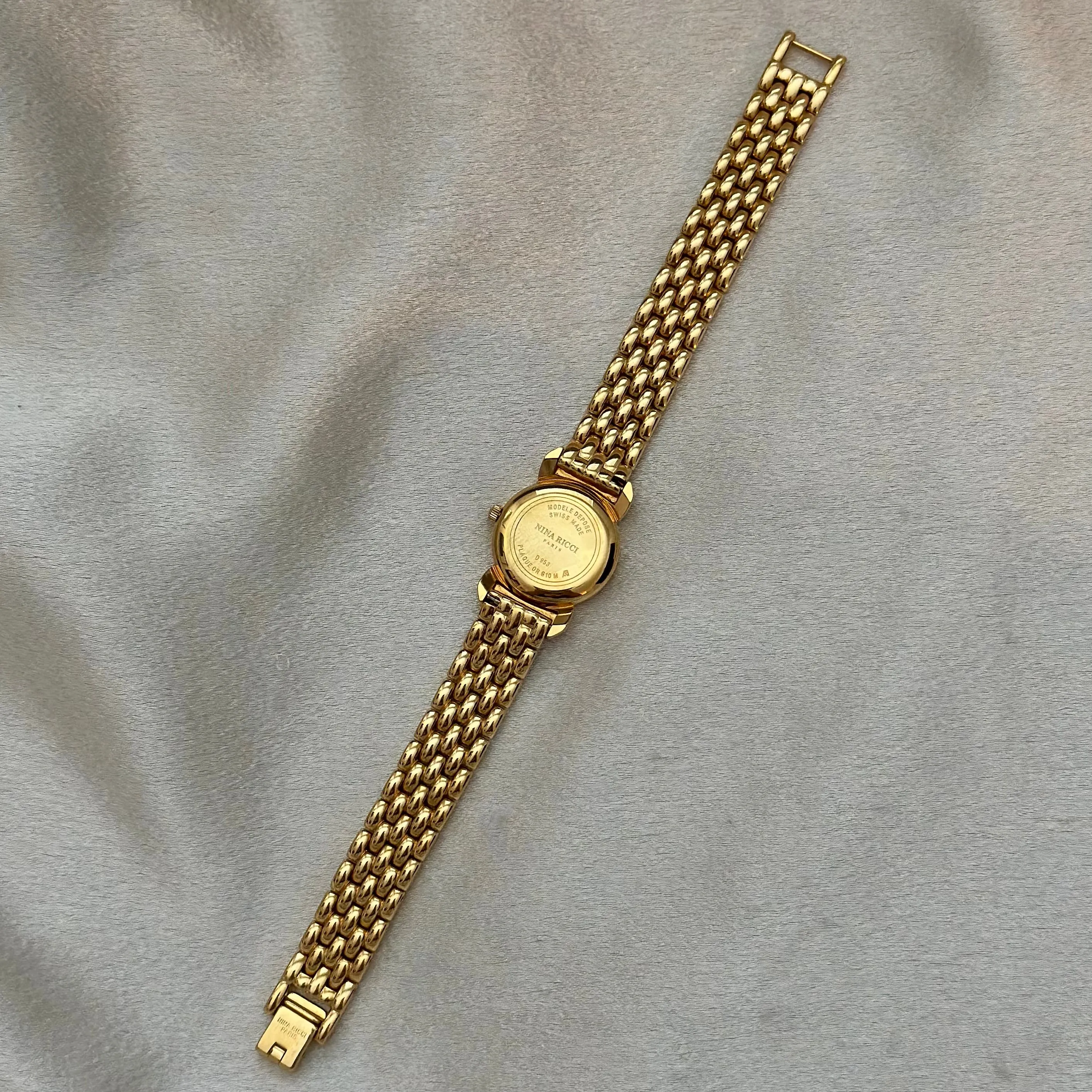 VINTAGE NINA RICCI MOTHER-OF-PEARL WATCH