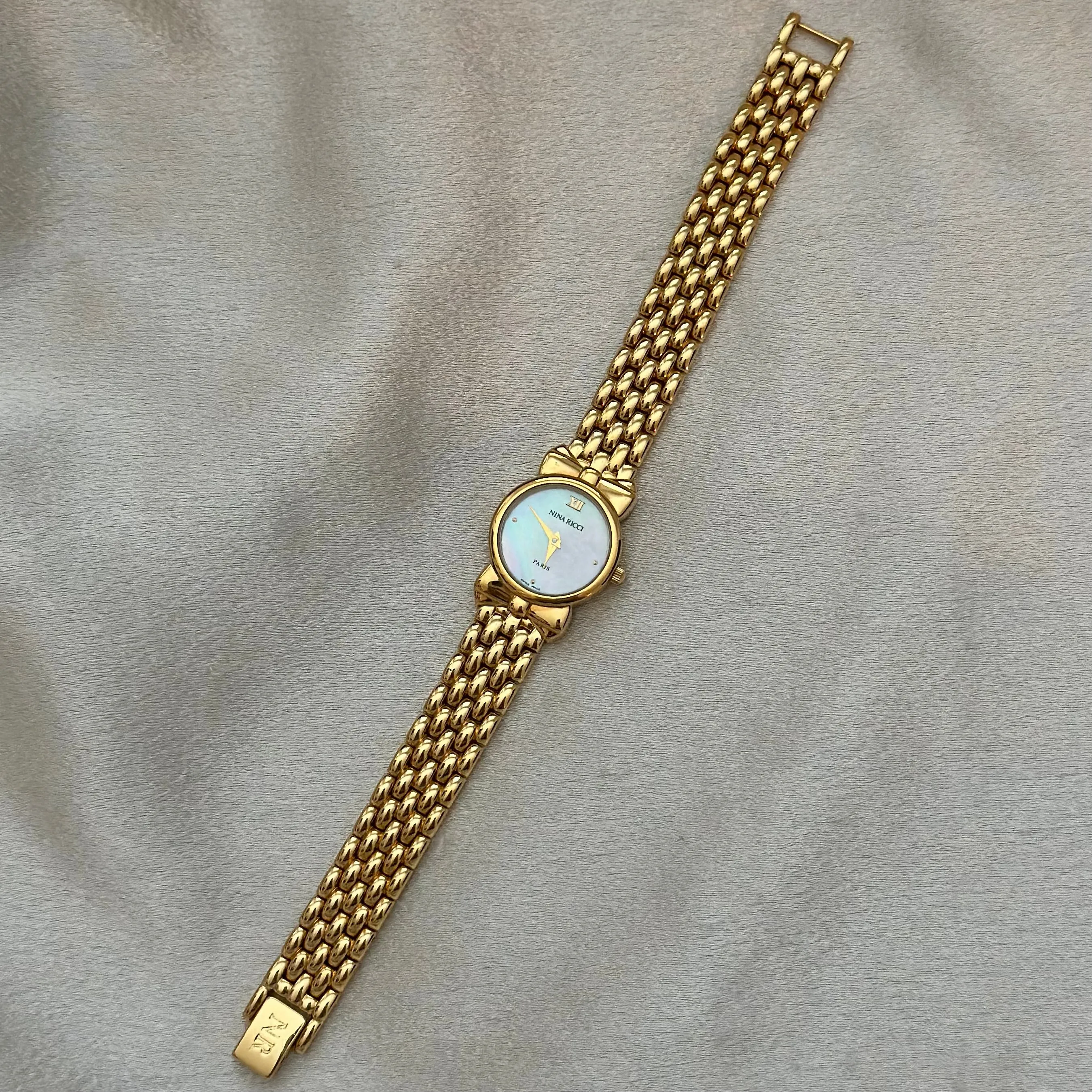 VINTAGE NINA RICCI MOTHER-OF-PEARL WATCH