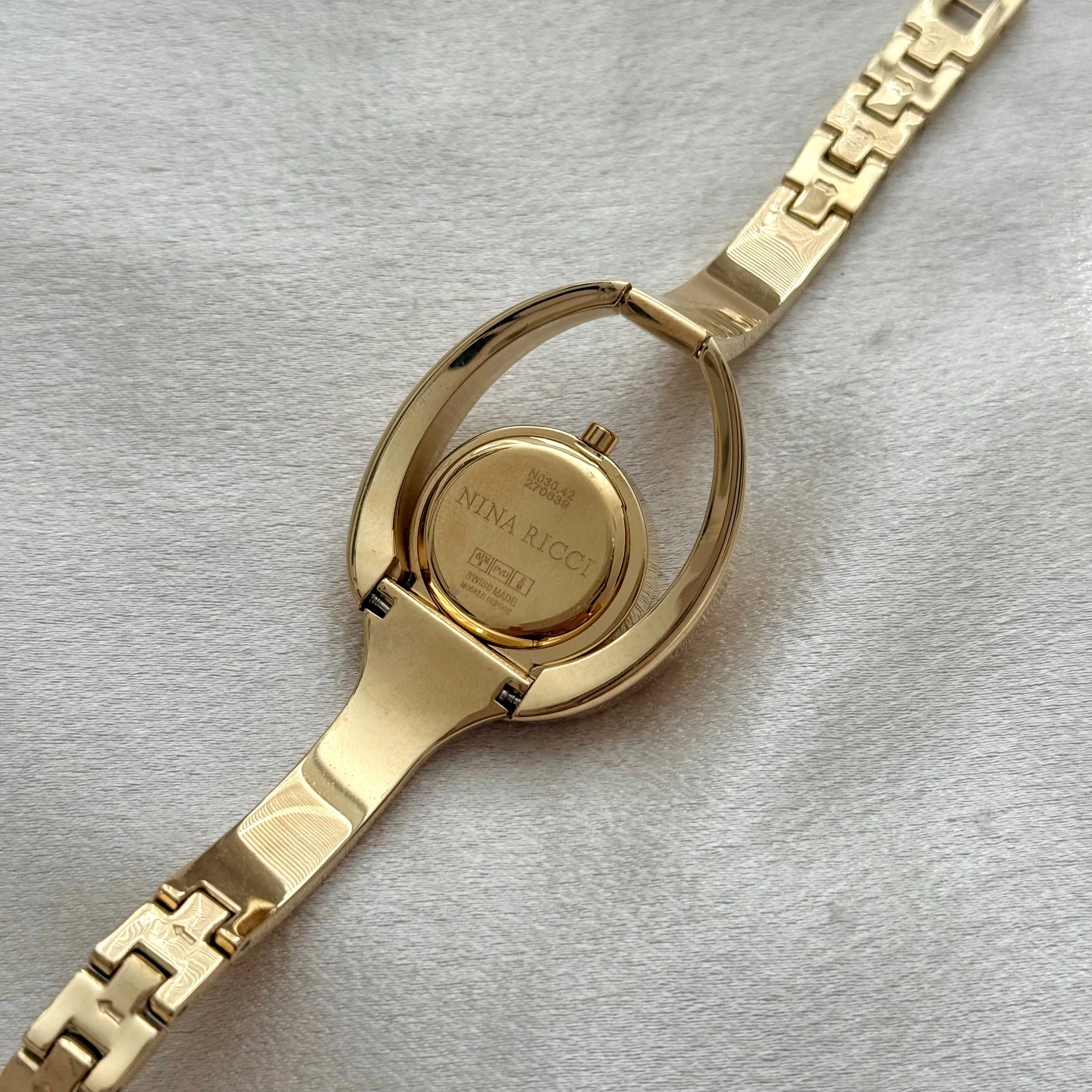 VINTAGE NINA RICCI MOTHER-OF-PEARL WATCH