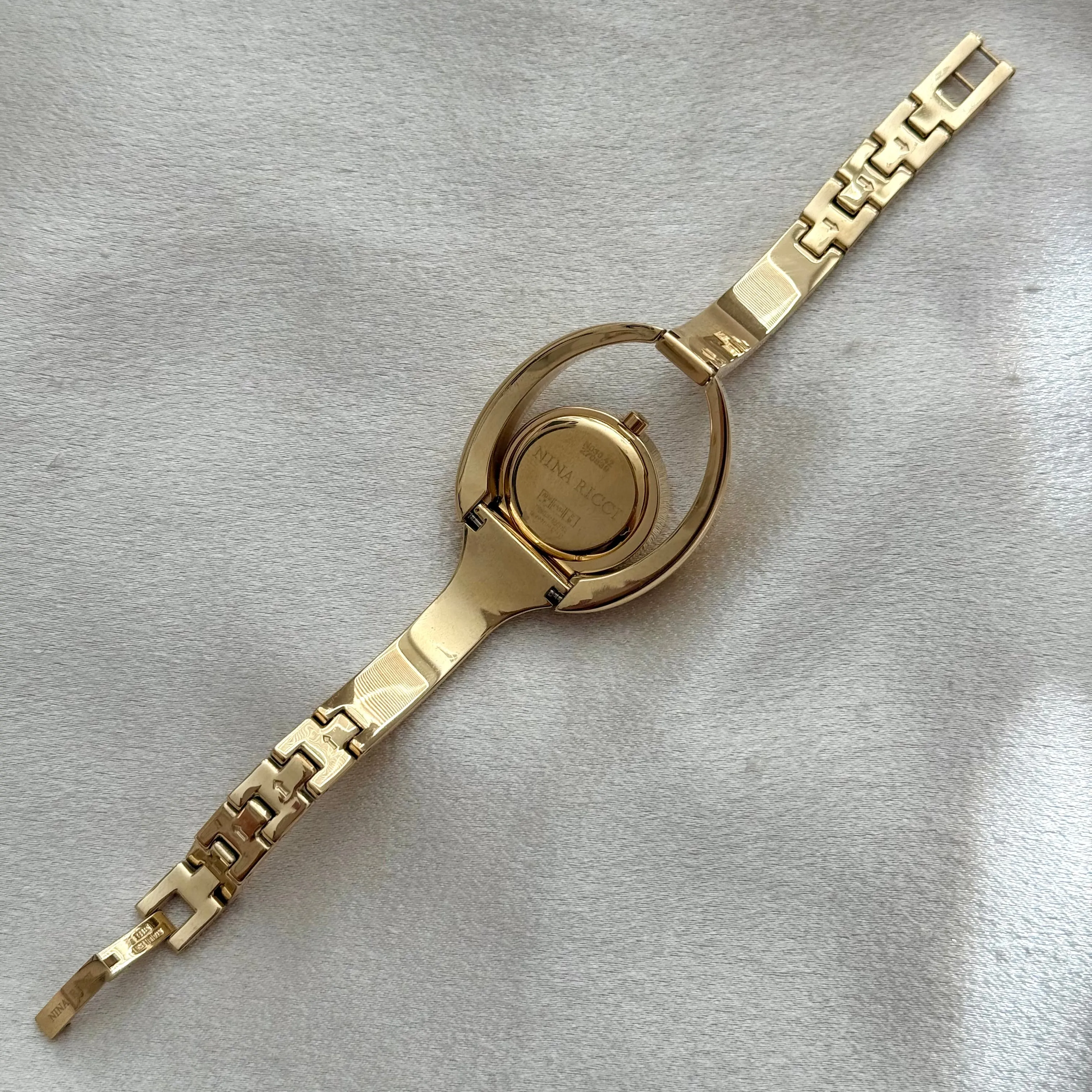 VINTAGE NINA RICCI MOTHER-OF-PEARL WATCH