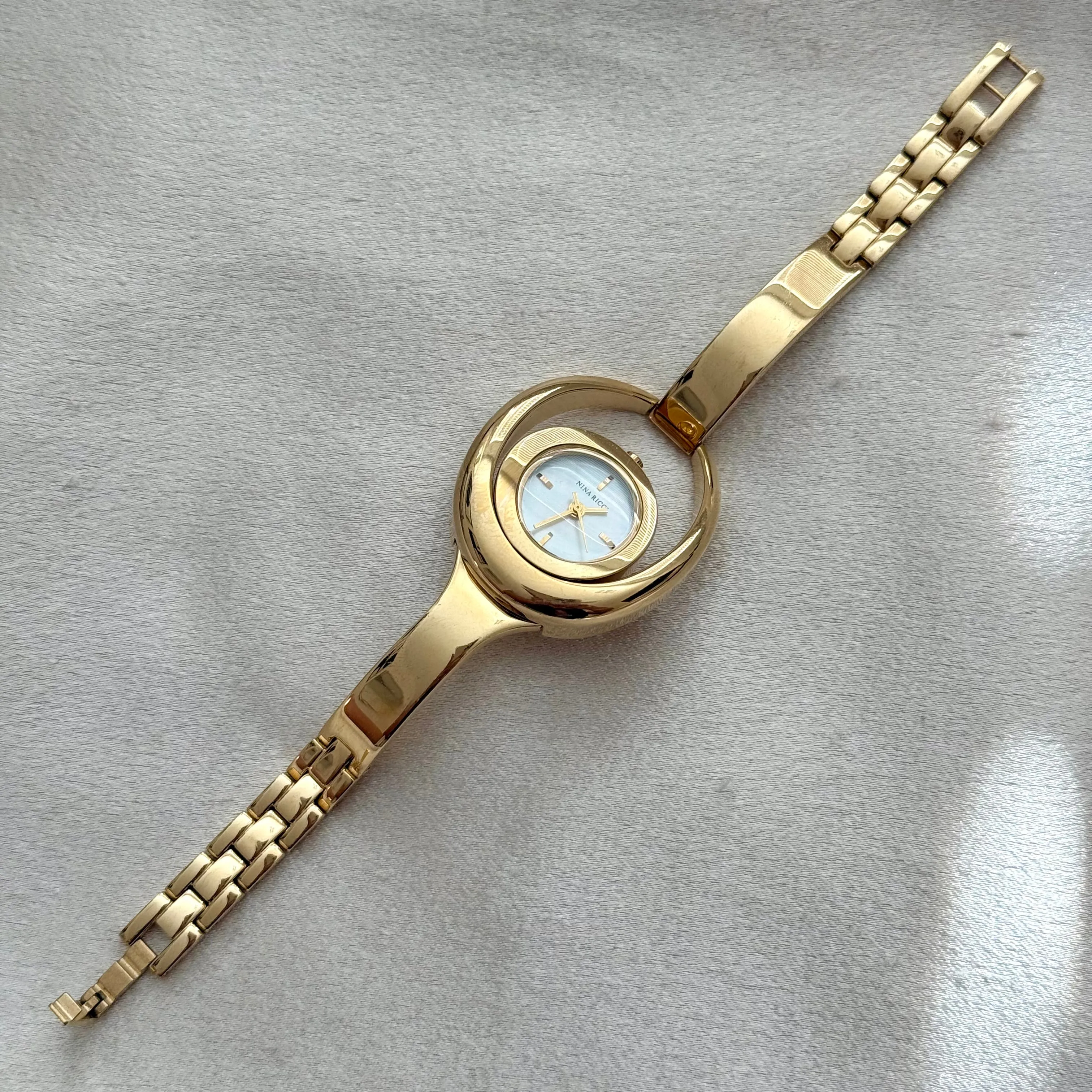 VINTAGE NINA RICCI MOTHER-OF-PEARL WATCH