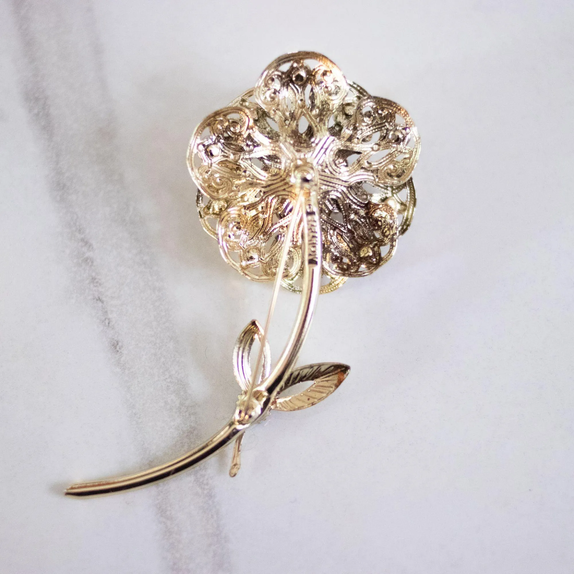 Vintage Sarah Coventry Gold Flower Brooch with Red Aurora Borealis Rhinestones