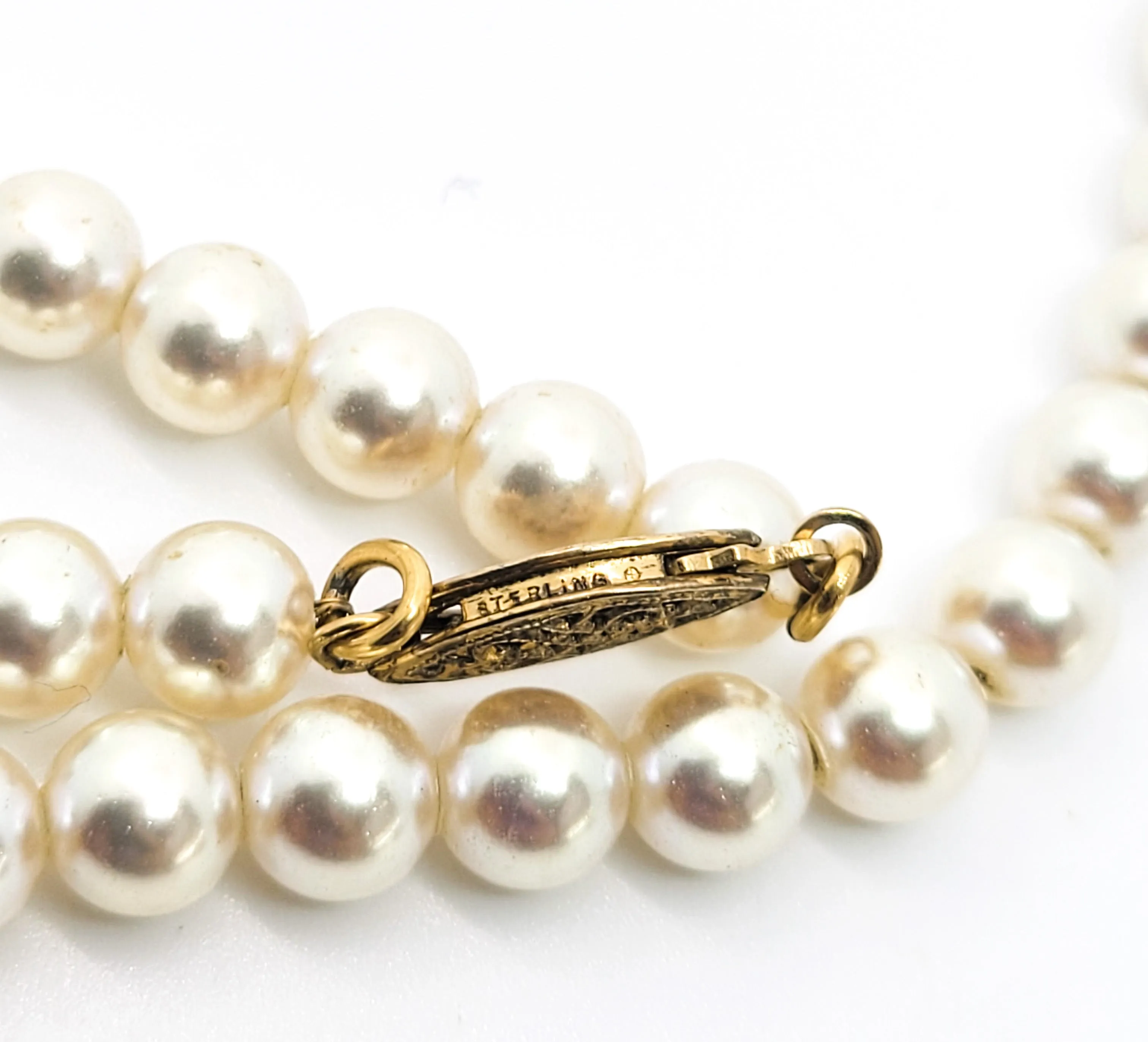 White 6mm faux pearl vintage necklace with sterling silver clasp mounted on chain