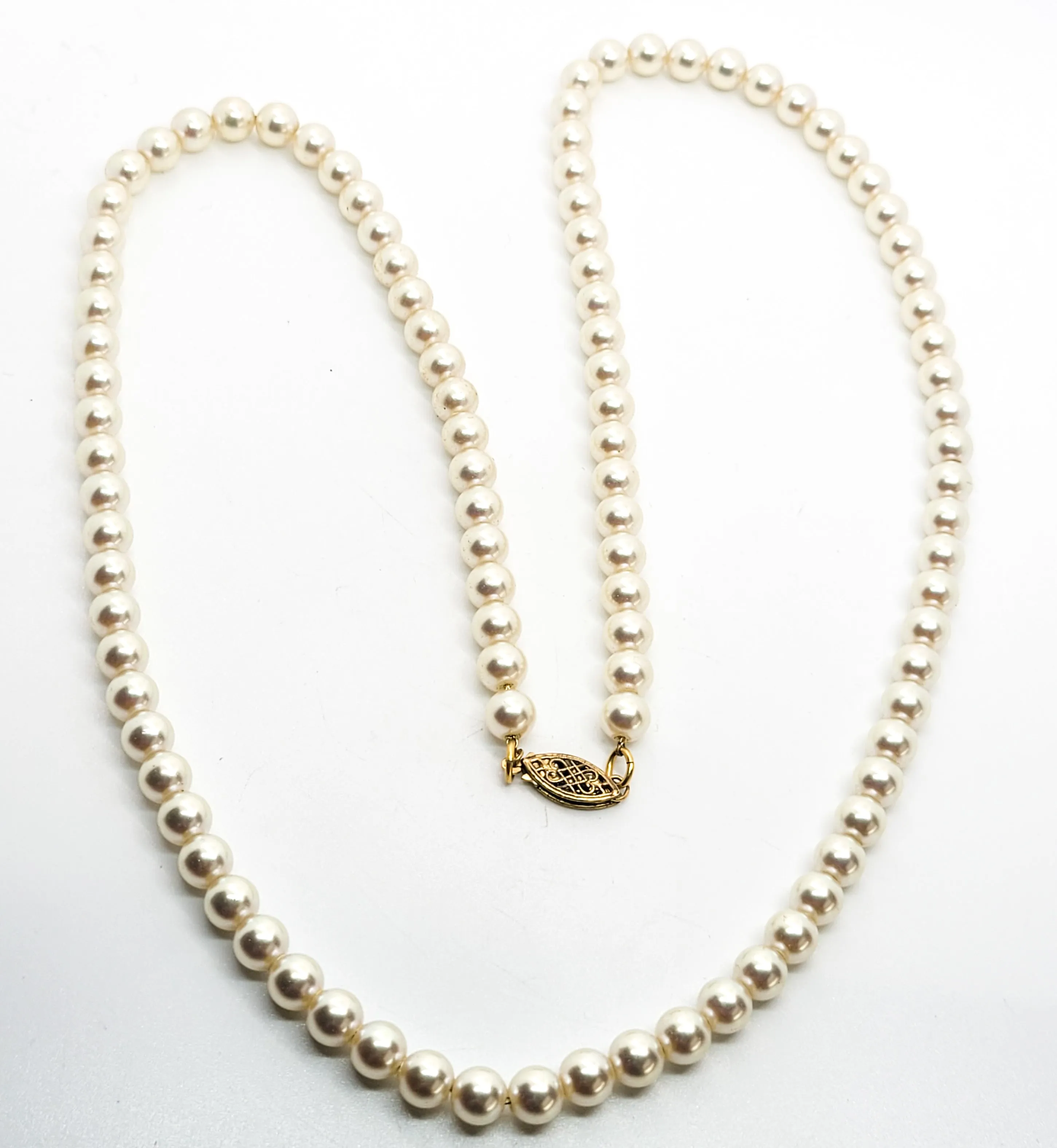 White 6mm faux pearl vintage necklace with sterling silver clasp mounted on chain